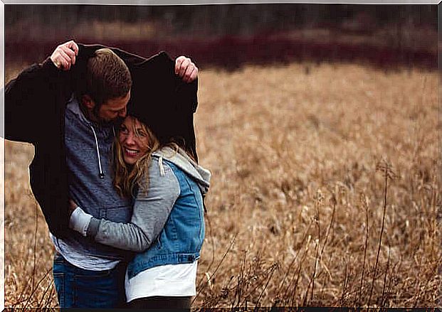 Couple embraced outdoors