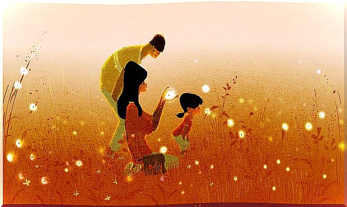 happy family in a firefly field