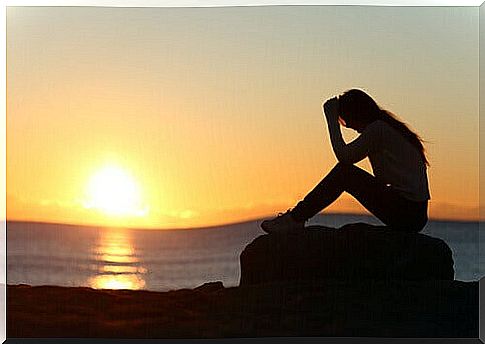 woman-sitting-at-sunset learn