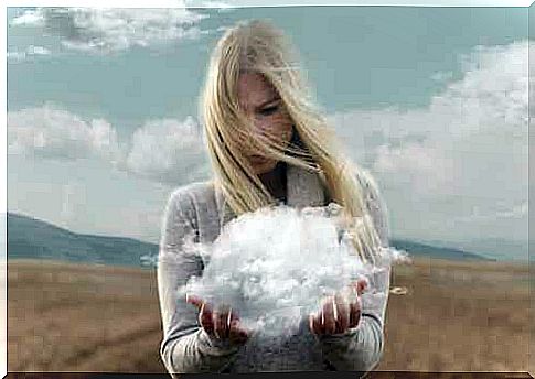 Woman with cloud in her hands.