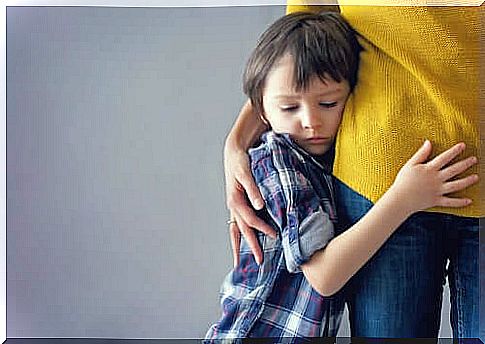 Child hugged to mother.