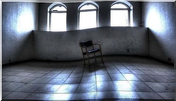 Chair in the middle of an empty room